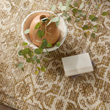 Featuring Cardamom Sarang Rug by Jaipur Living at Amethyst Home. The hand-tufted Cardamom Sarang boasts vivid jewel tones and uniquely distressed Turkish motifs, crafted to emulate traditional sun-faded, vintage designs. The Sarang rug showcases a floral trellis motif in a mix of warm and earthy hues including brown, gold, cream, beige, and hints of blue. Amethyst Home provides interior design, new home construction design consulting, vintage area rugs, and lighting in the Laguna Beach metro area.