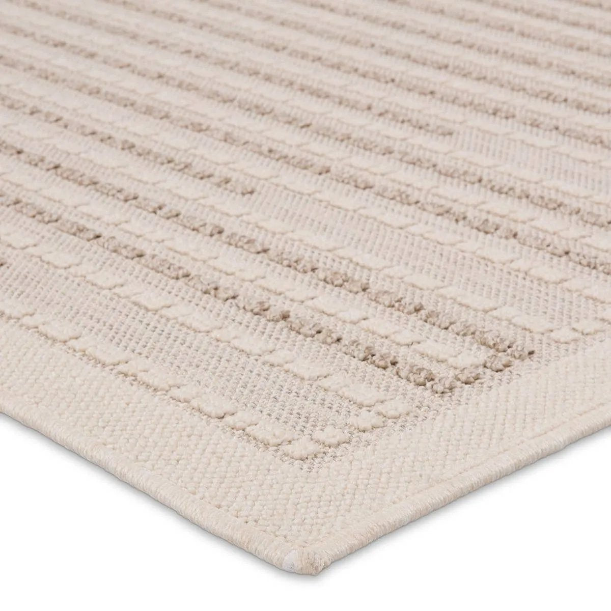 Featuring Continuum Theorem Rug by Jaipur Living at Amethyst Home. The Continuum collection brings the classic sisal look to outdoor spaces and high-traffic indoor areas. The soft Axiom design features an abstract, geometric pattern with cream high-low pile for added dimension. The polypropylene fibers are stain and water resistant for an easy-care accent . Amethyst Home provides interior design, new home construction design consulting, vintage area rugs, and lighting in the Des Moines metro area.