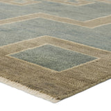 Featuring Cyprus Kyrenia Blue Hand-Knotted Rug by Jaipur Living at Amethyst Home. The hand-knotted Cyprus collection showcases a modern representation of vintage Kars designs with clean-lined geometric details and fresh colorways. The blue, sage, and cream Kyrenia design delights with an antique medallion pattern and a similarly styled border. Low pile and naturally stain resis. Amethyst Home provides interior design, new construction, custom furniture, and area rugs in the Kansas City metro area.