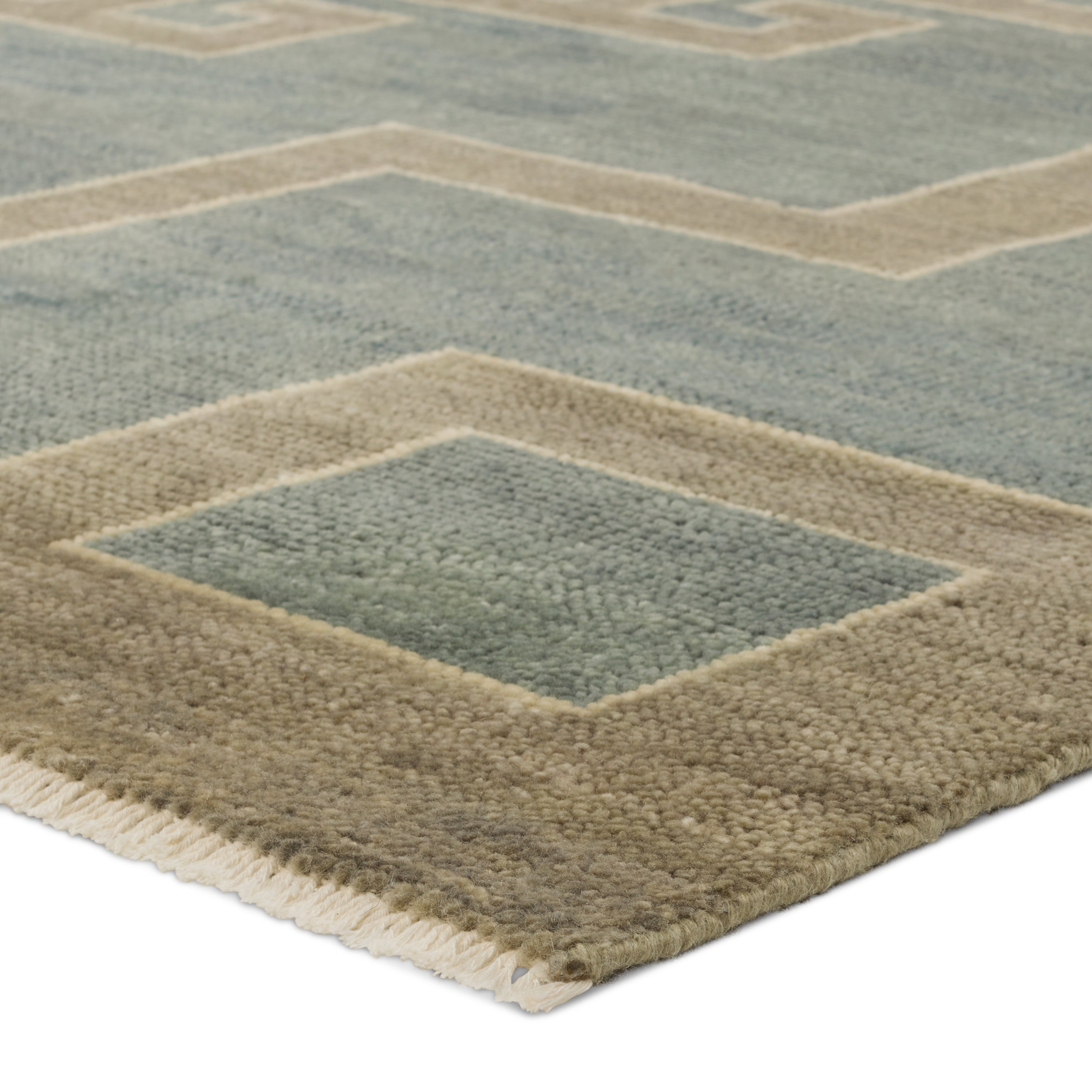 Featuring Cyprus Kyrenia Blue Hand-Knotted Rug by Jaipur Living at Amethyst Home. The hand-knotted Cyprus collection showcases a modern representation of vintage Kars designs with clean-lined geometric details and fresh colorways. The blue, sage, and cream Kyrenia design delights with an antique medallion pattern and a similarly styled border. Low pile and naturally stain resis. Amethyst Home provides interior design, new construction, custom furniture, and area rugs in the Kansas City metro area.