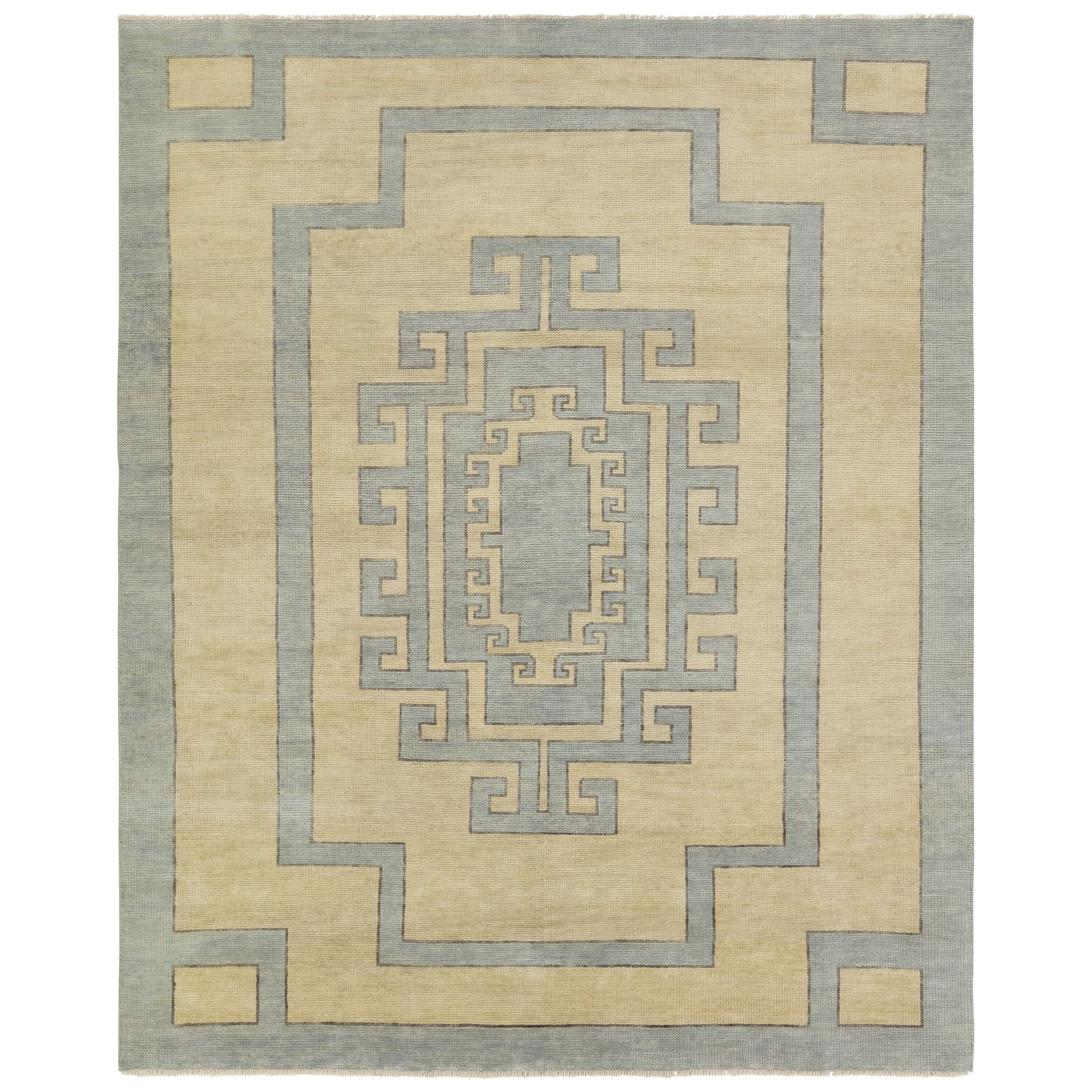 Featuring Cyprus Nicosia Asparagus Hand-Knotted Rug by Jaipur Living at Amethyst Home. The hand-knotted Cyprus collection showcases a modern representation of vintage Kars designs with clean-lined geometric details and fresh colorways. The blue, cream, gray, and caramel colored Nicosia design delights with a minimalistic medallion pattern and multiple borders. Low pile and natura. Amethyst Home provides interior design, new construction, custom furniture, and area rugs in the Nashville metro area.
