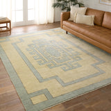 Featuring Cyprus Nicosia Asparagus Hand-Knotted Rug by Jaipur Living at Amethyst Home. The hand-knotted Cyprus collection showcases a modern representation of vintage Kars designs with clean-lined geometric details and fresh colorways. The blue, cream, gray, and caramel colored Nicosia design delights with a minimalistic medallion pattern and multiple borders. Low pile and natur. Amethyst Home provides interior design, new construction, custom furniture, and area rugs in the Scottsdale metro area.