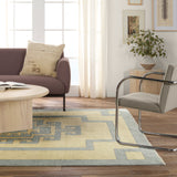 Featuring Cyprus Nicosia Asparagus Hand-Knotted Rug by Jaipur Living at Amethyst Home. The hand-knotted Cyprus collection showcases a modern representation of vintage Kars designs with clean-lined geometric details and fresh colorways. The blue, cream, gray, and caramel colored Nicosia design delights with a minimalistic medallion pattern and multiple borders. Low pile and naturall. Amethyst Home provides interior design, new construction, custom furniture, and area rugs in the Seattle metro area.