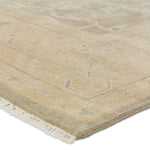 Featuring Eloquent Beige Verity Hand-Knotted Rug by Jaipur Living at Amethyst Home. The Eloquent collection emanates traditional elegance, lending a soft and serene look to transitional homes. The Verity area rug features a faded Oushak design in muted beige, light gray, and tan tones. This hand-knotted wool and viscose rug grounds living spaces with a classic, earthy look. Cr. Amethyst Home provides interior design, new construction, custom furniture, and area rugs in the Laguna Beach metro area.