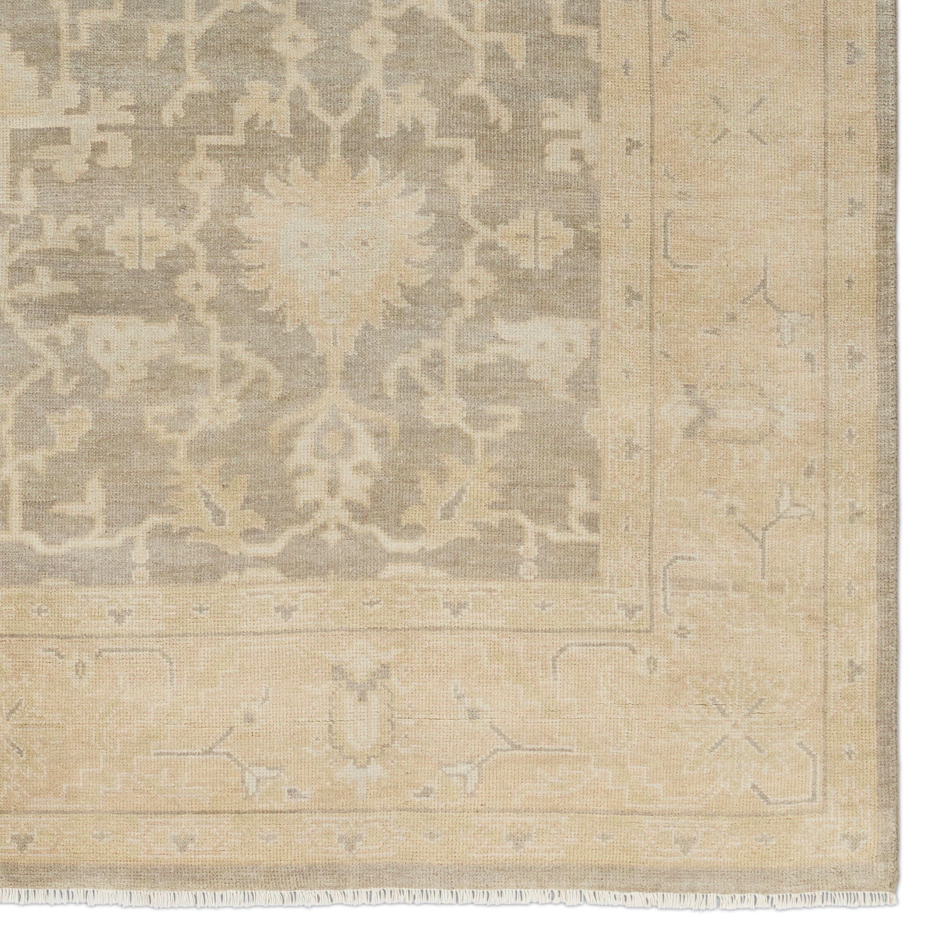 Featuring Eloquent Beige Verity Hand-Knotted Rug by Jaipur Living at Amethyst Home. The Eloquent collection emanates traditional elegance, lending a soft and serene look to transitional homes. The Verity area rug features a faded Oushak design in muted beige, light gray, and tan tones. This hand-knotted wool and viscose rug grounds living spaces with a classic, earthy look. C. Amethyst Home provides interior design, new construction, custom furniture, and area rugs in the Newport Beach metro area.