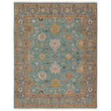 Featuring Everly Aloft Hand-Knotted Rug by Jaipur Living at Amethyst Home. The updated traditional Everly collection features Oushak-inspired designs in whimsical color palettes. The Aloft design features a lively colorway of blue, pink, yellow, navy, cream, peach, and taupe. This hand-knotted wool rug anchors living spaces with a fresh take on vintage style. The low, easy-care p. Amethyst Home provides interior design, new construction, custom furniture, and area rugs in the Charlotte metro area.