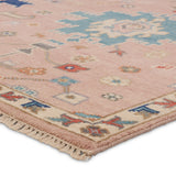 Featuring Everly Matera Hand-Knotted Rug by Jaipur Living at Amethyst Home. The updated traditional Everly collection features Oushak-inspired designs in whimsical color palettes. The Matera design features a sweet colorway of pink, yellow, navy, cream, peach, and taupe. This hand-knotted wool rug anchors living spaces with a fresh take on vintage style. The low, easy-care pile d. Amethyst Home provides interior design, new construction, custom furniture, and area rugs in the San Diego metro area.