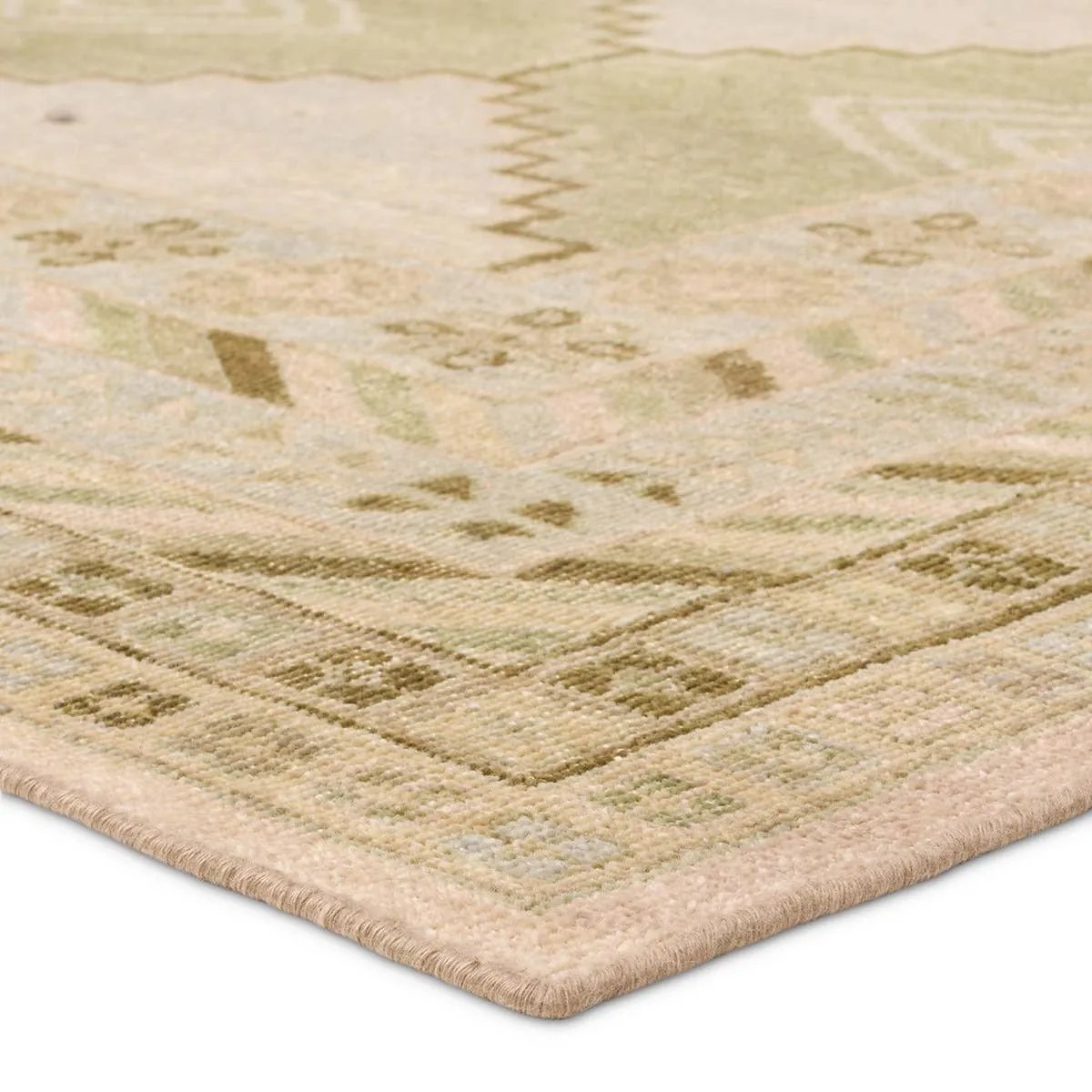 Featuring Gallant Enfield Hand-Knotted Rug by Jaipur Living at Amethyst Home. The updated traditional Gallant Enfield is an assortment of beautifully colored hand-knotted designs. The Enfield area rug showcases a vintage-inspired bordered medallion design in on-trend green, cream, light blue, and tan tones, stunningly distressed for texture and antiquity. C. Amethyst Home provides interior design, new home construction design consulting, vintage area rugs, and lighting in the San Diego metro area.
