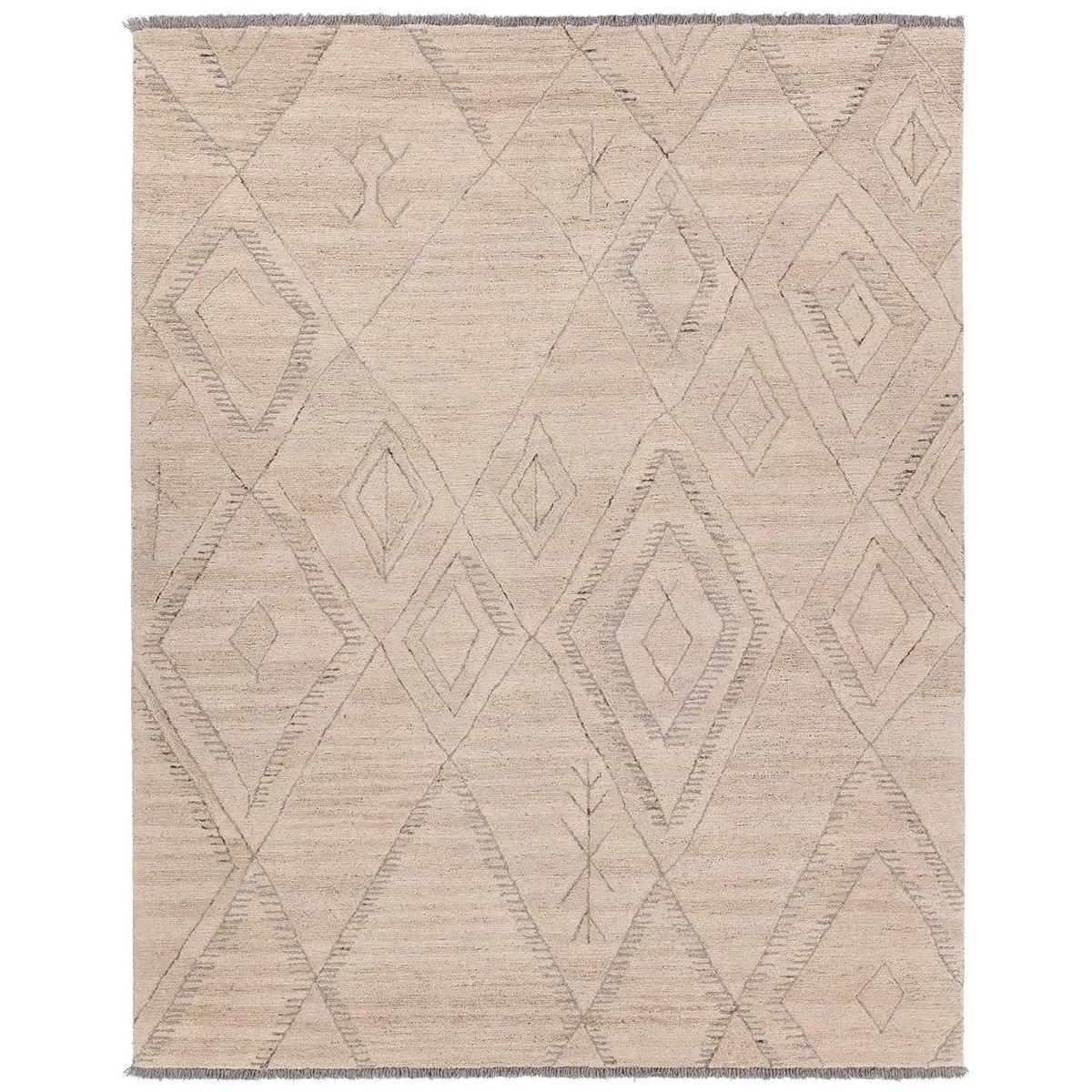 Featuring Hadi Anisah Rug by Jaipur Living at Amethyst Home. The hand-tufted Hadi Anisah introduces fresh looks inspired by modern Moroccan patterns and neutral colorways. The Anisah design features a trellis with geometric detailing, encompassing North African styles in cream and gray hues. Short, gray fringe and 100% wool pile adds to the global appe. Amethyst Home provides interior design, new home construction design consulting, vintage area rugs, and lighting in the Salt Lake City metro area.