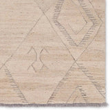 Featuring Hadi Anisah Rug by Jaipur Living at Amethyst Home. The hand-tufted Hadi Anisah introduces fresh looks inspired by modern Moroccan patterns and neutral colorways. The Anisah design features a trellis with geometric detailing, encompassing North African styles in cream and gray hues. Short, gray fringe and 100% wool pile adds to the global appeal. Thi. Amethyst Home provides interior design, new home construction design consulting, vintage area rugs, and lighting in the Seattle metro area.