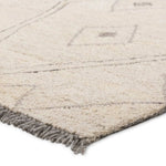 Featuring Hadi Ismael Rug by Jaipur Living at Amethyst Home. The hand-tufted Hadi Ismael introduces fresh looks inspired by modern Moroccan patterns and neutral colorways. The Ismael design features overlapping stripes in cream and gray hues. Short, gray fringe and 100% wool pile adds to the global appeal. This rug is naturally stain-resistant and works best i. Amethyst Home provides interior design, new home construction design consulting, vintage area rugs, and lighting in the Dallas metro area.