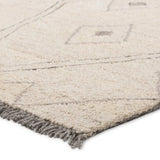 Featuring Hadi Ismael Rug by Jaipur Living at Amethyst Home. The hand-tufted Hadi Ismael introduces fresh looks inspired by modern Moroccan patterns and neutral colorways. The Ismael design features overlapping stripes in cream and gray hues. Short, gray fringe and 100% wool pile adds to the global appeal. This rug is naturally stain-resistant and works best i. Amethyst Home provides interior design, new home construction design consulting, vintage area rugs, and lighting in the Dallas metro area.