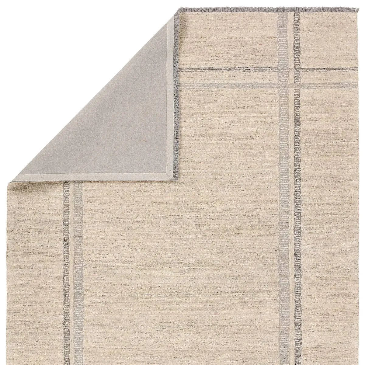 Featuring Hadi Bilal Rug by Jaipur Living at Amethyst Home. The hand-tufted Hadi Bilal introduces fresh looks inspired by modern Moroccan patterns and neutral colorways. The Bilal design features a trellis with geometric detailing, encompassing North African styles in cream and gray hues. Short, gray fringe and 100% wool pile adds to the global appeal. This rug. Amethyst Home provides interior design, new home construction design consulting, vintage area rugs, and lighting in the Miami metro area.