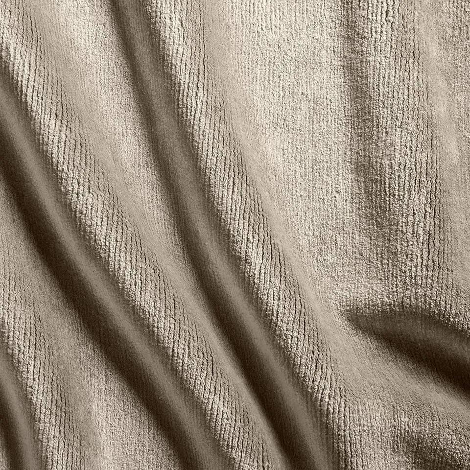 Featuring Hemara Cachemira Hand-Knotted Rug by Jaipur Living at Amethyst Home. A testament to craftsmanship and sophistication. Hand knotted by expert artisans in India, the Hemara Cachemira is more than just a rug; it's a masterpiece of artistry and luxury. The Cachemira design weaves a tale of softness and sophistication through meticulously crafted cut pi. Amethyst Home provides interior design, new home construction design consulting, vintage area rugs, and lighting in the Monterey metro area.