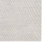 Featuring Indira Zivian Hand-Knotted Rug by Jaipur Living at Amethyst Home. Rich in detail and plush underfoot, the Indira Zivian is made up of neutral-toned modern Moroccan styles. The Zivian area rug features a slight sheen and luxurious hand-knotted construction of natural wool and viscose. A soft linear design provides geometric interest in an light bl. Amethyst Home provides interior design, new home construction design consulting, vintage area rugs, and lighting in the Alpharetta metro area.