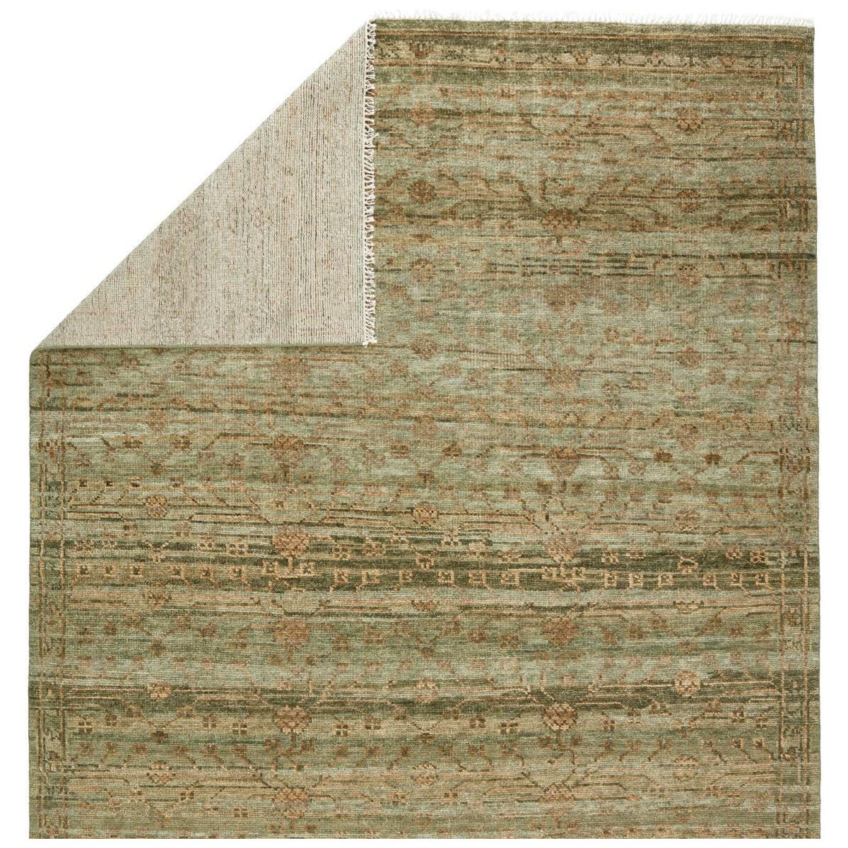Featuring Jinsen Augusta Hand-Knotted Rug by Jaipur Living at Amethyst Home. The hand-knotted Jinsen Augusta features a fresh incarnation of the vintage Turkish textile look. Classic in pattern and modern in color, the Augusta rug boasts a beautiful palette of green, burnished gold, and hints of taupe featuring distinct dye-lot details and subtle fringe. Th. Amethyst Home provides interior design, new home construction design consulting, vintage area rugs, and lighting in the Park City metro area.