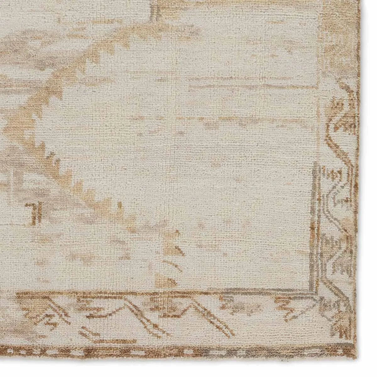 Featuring Jinsen Alamo Rug by Jaipur Living at Amethyst Home. The hand-knotted Jinsen collection features a fresh incarnation of the vintage Turkish textile look. Classic in pattern and modern in color, the Alamo rug boasts a beautiful palette of cream, beige, gold, and brown, featuring distinct dye-lot details and subtle fringe. This artisan-crafted medall. Amethyst Home provides interior design, new home construction design consulting, vintage area rugs, and lighting in the Calabasas metro area.