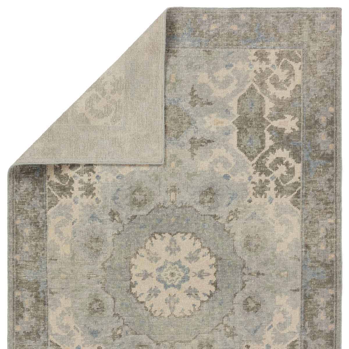 Featuring Kai Modify Hand-Knotted Rug by Jaipur Living at Amethyst Home. The artisan-made Kai collection effortlessly blends the contemporary influence of color with traditionally timeless looks. Exceptionally made and artfully designed, the hand knotted Modify area rug infuses homes with vintage allure. This wool accent boasts an elegant center medallion and s. Amethyst Home provides interior design, new home construction design consulting, vintage area rugs, and lighting in the Omaha metro area.