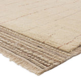 Featuring Kazben Atalaya Hand-Knotted Rug by Jaipur Living at Amethyst Home. Full of texture, the handknotted Kazben Atalaya stuns with modern Moroccan patterns in natural hues. The Atalaya design delights with a gray and brown abstract-linear pattern on a cream base. A dotted border adds the finishing touches to this elevated accent piece. Low, ribbed . Amethyst Home provides interior design, new home construction design consulting, vintage area rugs, and lighting in the Winter Garden metro area.