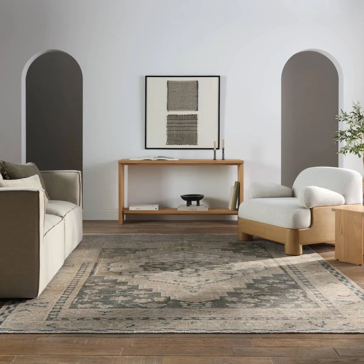 Featuring Lumal Pasain Rug by Jaipur Living at Amethyst Home. Distressed, vintage designs offer an elevated tone for the Lumal Collection. The Pasin rug features an updated traditional inspired medallion and multiple floral borders in tones of navy, light green, cream, gray, and tan. This machine washable rug is stain resistant and easy to clean, perfect fo. Amethyst Home provides interior design, new home construction design consulting, vintage area rugs, and lighting in the San Diego metro area.