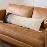 Featuring Mercado Sabir Pillow by Jaipur Living at Amethyst Home. The Mercado pillow Sabir marries bohemian charm and irresistible texture. The Sabir lumbar pillow offers a warm and cozy accent to modern spaces with a versatile, striped design and bohemian-style corner tassels. Crafted of soft cotton, this plush accent's light gray, white, and black heather. Amethyst Home provides interior design, new home construction design consulting, vintage area rugs, and lighting in the Nashville metro area.