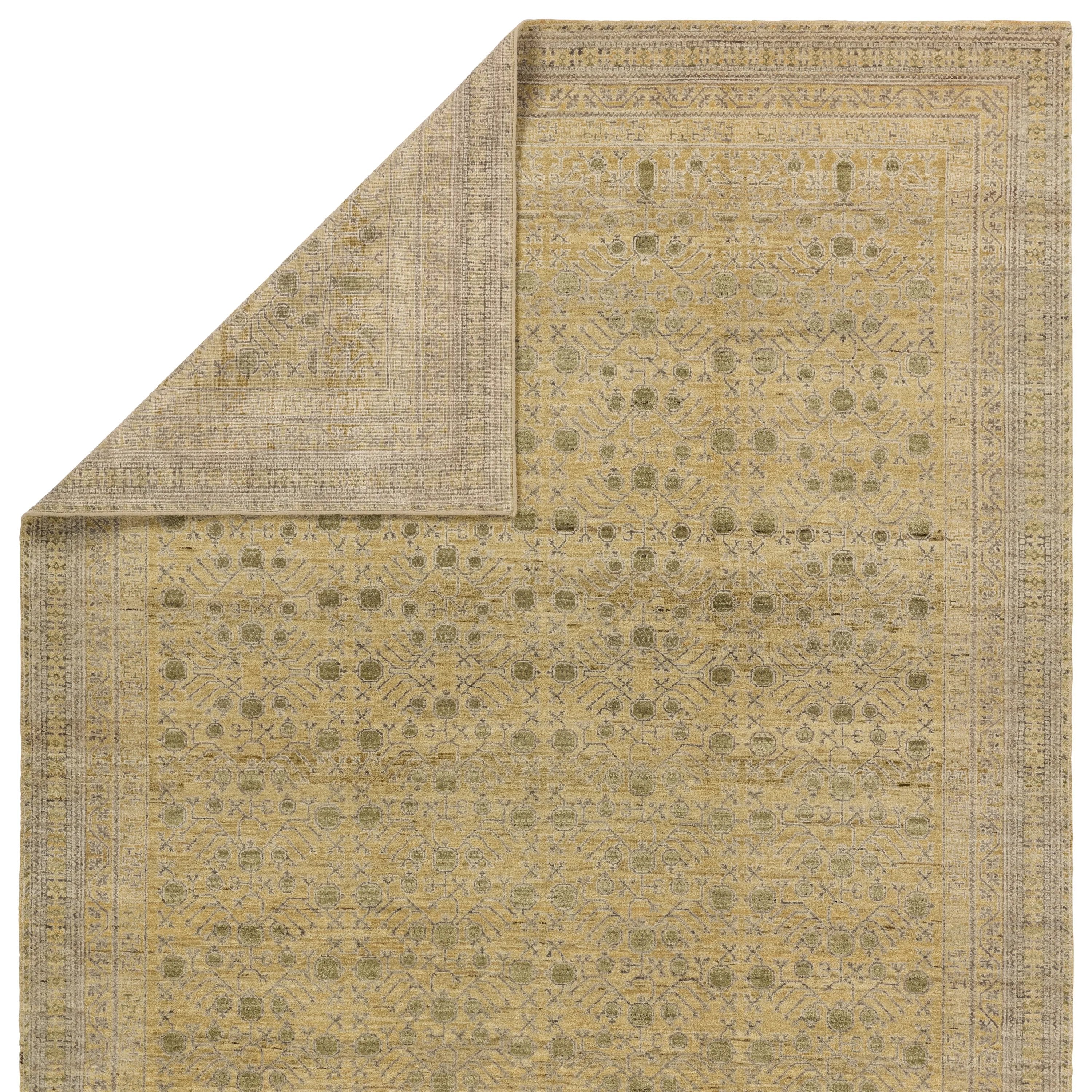 Featuring Mihret Delacor Hand Knotted Rug by Jaipur Living at Amethyst Home. The handknotted Mihret collection gathers inspiration from traditional patterns that offer elegance and a refined, modern colorway. Expertly handcrafted in India with 64 knots per square inch for unparalleled quality, the Delacor design features traditional trellis and geometric detail. Amethyst Home provides interior design, new home construction design consulting, vintage area rugs, and lighting in the Tampa metro area.