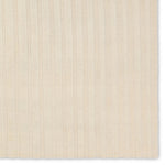 Featuring Modo Brida Rug by Jaipur Living at Amethyst Home. The stunning Modo collection features a statement of modernity in an artisan-crafted quality. This hand-knotted wool rug showcases a compelling textural linear motif and luxurious white colorway. Varied stripes created by cut and loop pile define the Brida area rug. The 100% undyed wool fibers are n. Amethyst Home provides interior design, new home construction design consulting, vintage area rugs, and lighting in the Monterey metro area.