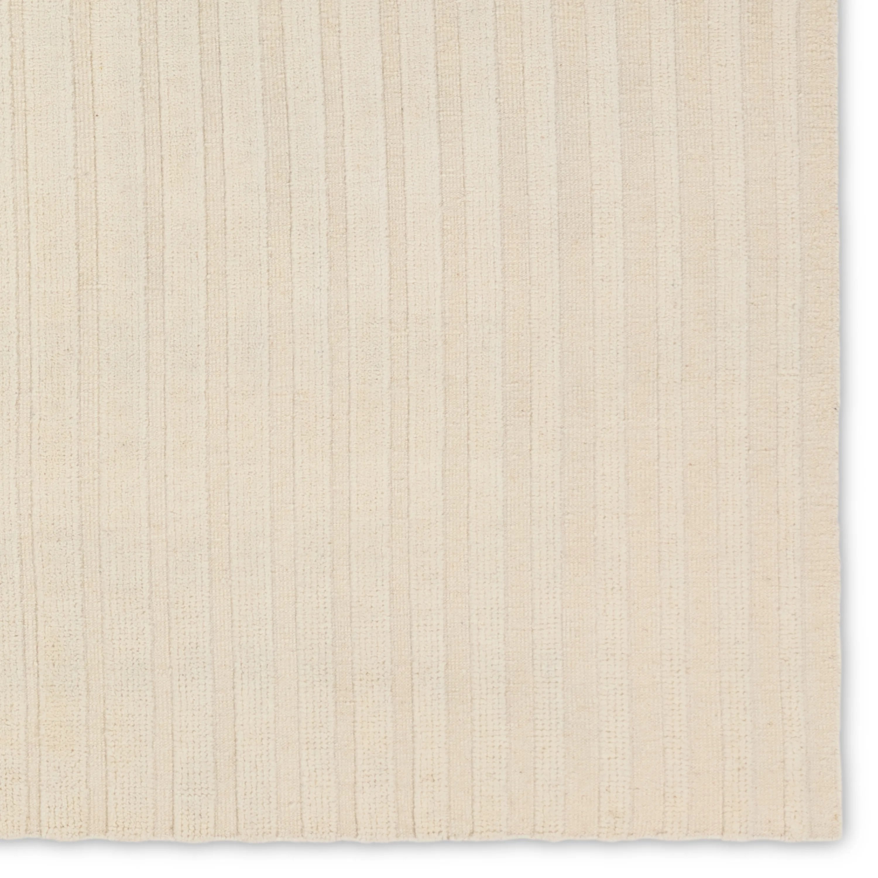 Featuring Modo Brida Rug by Jaipur Living at Amethyst Home. The stunning Modo collection features a statement of modernity in an artisan-crafted quality. This hand-knotted wool rug showcases a compelling textural linear motif and luxurious white colorway. Varied stripes created by cut and loop pile define the Brida area rug. The 100% undyed wool fibers are n. Amethyst Home provides interior design, new home construction design consulting, vintage area rugs, and lighting in the Monterey metro area.