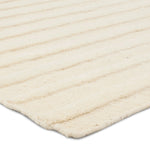 Featuring Modo Brida Rug by Jaipur Living at Amethyst Home. The stunning Modo collection features a statement of modernity in an artisan-crafted quality. This hand-knotted wool rug showcases a compelling textural linear motif and luxurious white colorway. Varied stripes created by cut and loop pile define the Brida area rug. The 100% undyed wool fibers. Amethyst Home provides interior design, new home construction design consulting, vintage area rugs, and lighting in the Salt Lake City metro area.