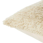 Featuring Montane Jardine Pillow by Jaipur Living at Amethyst Home. The hand-knotted Montane Jardine imbues spaces with modern Moroccan vibes and high-quality craftsmanship. This richly textured assortment of pillows features premium wool and silk blended fibers and an exceptional Persian knot quality. The shag Jardine pillow delights in a cozy cream colorw. Amethyst Home provides interior design, new home construction design consulting, vintage area rugs, and lighting in the Calabasas metro area.