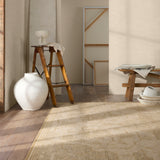 Featuring Onessa Danet Hand-Knotted Rug by Jaipur Living at Amethyst Home. The Onessa collection marries traditional motifs with soft, subdued colorways for the perfect blend of fresh and time-honored style. These hand-knotted wool rugs feature a hand-sheared quality that lends the design a coveted vintage impression. The Danet rug features a distressed, floral pattern in hues of tan. Amethyst Home provides interior design, new construction, custom furniture, and area rugs in the Tampa metro area.