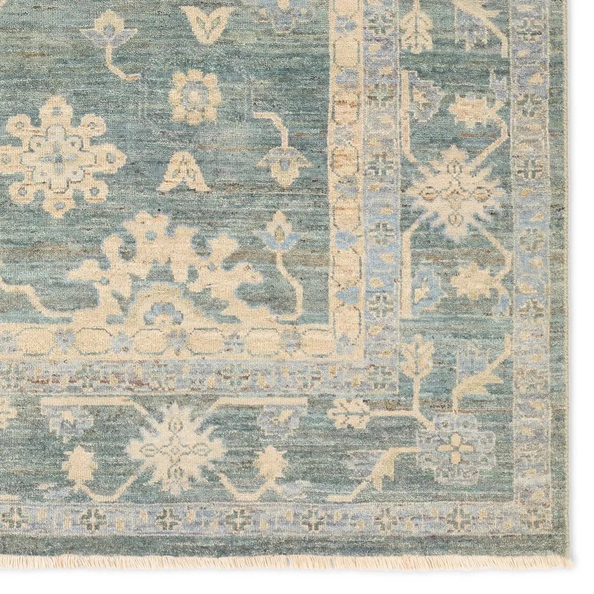 Featuring Orenda Kerensa Hand-Knotted Rug by Jaipur Living at Amethyst Home. The Orenda Kerensa features heirloom-quality designs of muted and uniquely updated Old World patterns. The Kerensa area rug boasts a beautifully washed medallion motif with an antique Oushak-inspired vibe. The cream tone is accented with cool blues, greens, and warm beige hues fo. Amethyst Home provides interior design, new home construction design consulting, vintage area rugs, and lighting in the Los Angeles metro area.