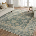 Featuring Orenda Kerensa Hand-Knotted Rug by Jaipur Living at Amethyst Home. The Orenda Kerensa features heirloom-quality designs of muted and uniquely updated Old World patterns. The Kerensa area rug boasts a beautifully washed medallion motif with an antique Oushak-inspired vibe. The cream tone is accented with cool blues, greens, and warm beige hues . Amethyst Home provides interior design, new home construction design consulting, vintage area rugs, and lighting in the Newport Beach metro area.