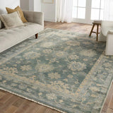 Featuring Orenda Kerensa Hand-Knotted Rug by Jaipur Living at Amethyst Home. The Orenda Kerensa features heirloom-quality designs of muted and uniquely updated Old World patterns. The Kerensa area rug boasts a beautifully washed medallion motif with an antique Oushak-inspired vibe. The cream tone is accented with cool blues, greens, and warm beige hues . Amethyst Home provides interior design, new home construction design consulting, vintage area rugs, and lighting in the Newport Beach metro area.