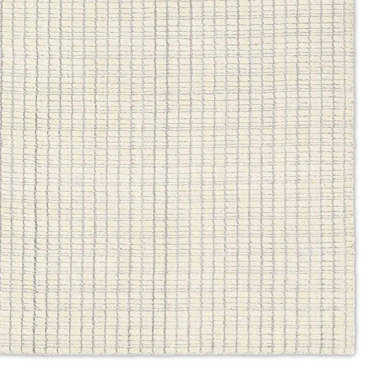Featuring Park City Sundance Rug by Jaipur Living at Amethyst Home. Handwoven in India, the Park City Sundance by Barclay Butera evokes a masculine modernity through neutral-toned grids. The modern Sundance rug showcases a grid in on-trend hues of cream and gray. The cut and looped pile adds texture while maintaining a soft hand. Polyester and wool fibers crea. Amethyst Home provides interior design, new home construction design consulting, vintage area rugs, and lighting in the Boston metro area.