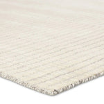 Featuring Park City Sundance Rug by Jaipur Living at Amethyst Home. Handwoven in India, the Park City Sundance by Barclay Butera evokes a masculine modernity through neutral-toned grids. The modern Sundance rug showcases a grid in on-trend hues of cream and gray. The cut and looped pile adds texture while maintaining a soft hand. Polyester and wool fib. Amethyst Home provides interior design, new home construction design consulting, vintage area rugs, and lighting in the Salt Lake City metro area.