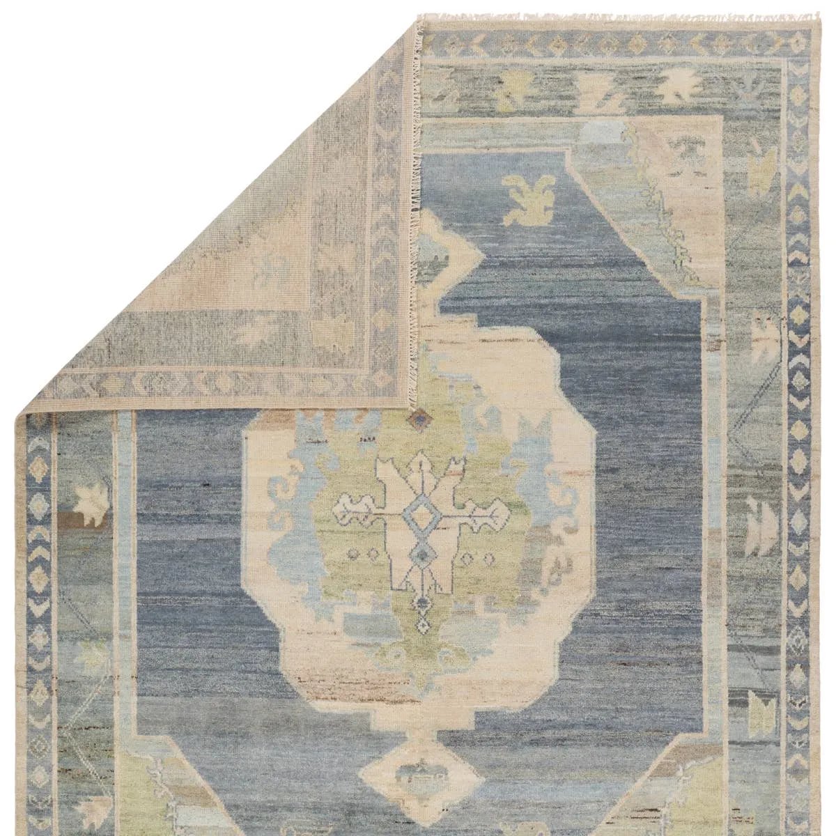 Featuring Reza Kieran Hand-Knotted Rug by Jaipur Living at Amethyst Home. The Reza Kieran is powerful and full of life. Inspired by exotic Oushak designs, it’s rich with color and design bravado. Soft and strong, dense, and lush with an impressive knot count per-square-inch. The Kieran design portrays hushed blues, greens, grays, and creams reminiscent of a . Amethyst Home provides interior design, new home construction design consulting, vintage area rugs, and lighting in the Monterey metro area.