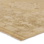 Featuring Rhapsody Folklore Hand-Knotted Rug by Jaipur Living at Amethyst Home. The Rhapsody collection features heirloom-quality designs of stunningly abrashed Old World patterns. The Folklore area rug boasts a beautifully washed medallion motif with a decorative border. The khaki tones are accented with cream and taupe hues for added depth and intrigue. This durable wool handk. Amethyst Home provides interior design, new construction, custom furniture, and area rugs in the Des Moines metro area.