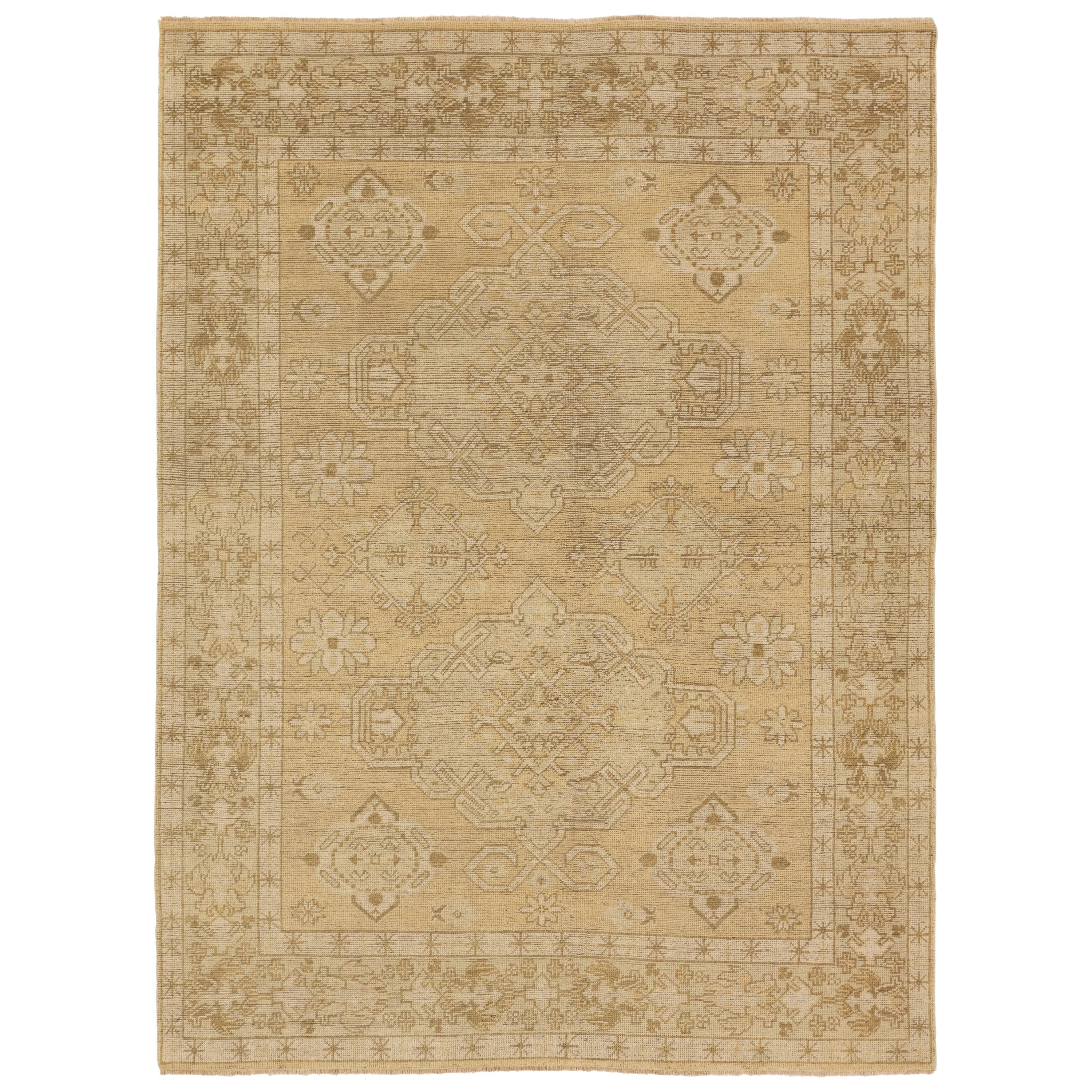 Featuring Rhapsody Folklore Hand-Knotted Rug by Jaipur Living at Amethyst Home. The Rhapsody collection features heirloom-quality designs of stunningly abrashed Old World patterns. The Folklore area rug boasts a beautifully washed medallion motif with a decorative border. The khaki tones are accented with cream and taupe hues for added depth and intrigue. This durable wool handkn. Amethyst Home provides interior design, new construction, custom furniture, and area rugs in the Nashville metro area.