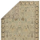 Featuring Rhapsody Markid Hand-Knotted Rug by Jaipur Living at Amethyst Home. The Rhapsody Markid features heirloom-quality designs of stunningly abrashed Old World patterns. The Markid area rug boasts a beautifully distressed floral and Oushak motif with a decorative border. The light blue and tan tones are accented with black and beige hues for added dept. Amethyst Home provides interior design, new home construction design consulting, vintage area rugs, and lighting in the Charlotte metro area.