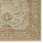 Featuring Rhapsody Gehenna Hand-Knotted Rug by Jaipur Living at Amethyst Home. The Rhapsody Gehenna features heirloom-quality designs of stunningly abrashed Old World patterns. The Gehenna area rug boasts a beautifully distressed medallion motif with a decorative border and floral detailing. The gray and brown tones are accented with light blue, sage, bei. Amethyst Home provides interior design, new home construction design consulting, vintage area rugs, and lighting in the Los Angeles metro area.