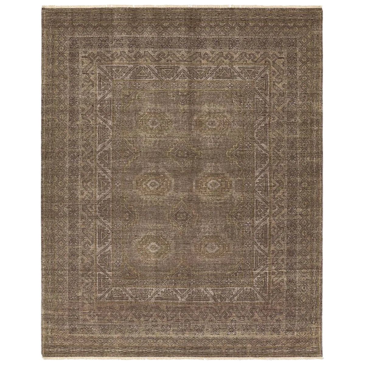 Featuring Rhapsody Kortan Hand-Knotted Rug by Jaipur Living at Amethyst Home. The Rhapsody Kortan features heirloom-quality designs of stunningly abrashed Old World patterns. The Kortan area rug boasts a beautifully distressed mini-medallion motif with a decorative, multi-layered border and geometric detailing. The brown, cream, and tan hues add depth and i. Amethyst Home provides interior design, new home construction design consulting, vintage area rugs, and lighting in the Charlotte metro area.