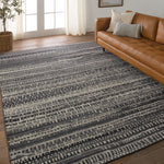 Featuring Rize Jamaal Hand-Knotted Rug by Jaipur Living at Amethyst Home. The Rize collection offers intricate and delicately designed global patterns to the modern home. The luxurious Jamaal area rug showcases a striped, linear motif in a classic gray, cream, and black colorway. This accent's hand-knotted wool construction ensures timeless durability and a stunning presence i. Amethyst Home provides interior design, new construction, custom furniture, and area rugs in the Laguna Beach metro area.