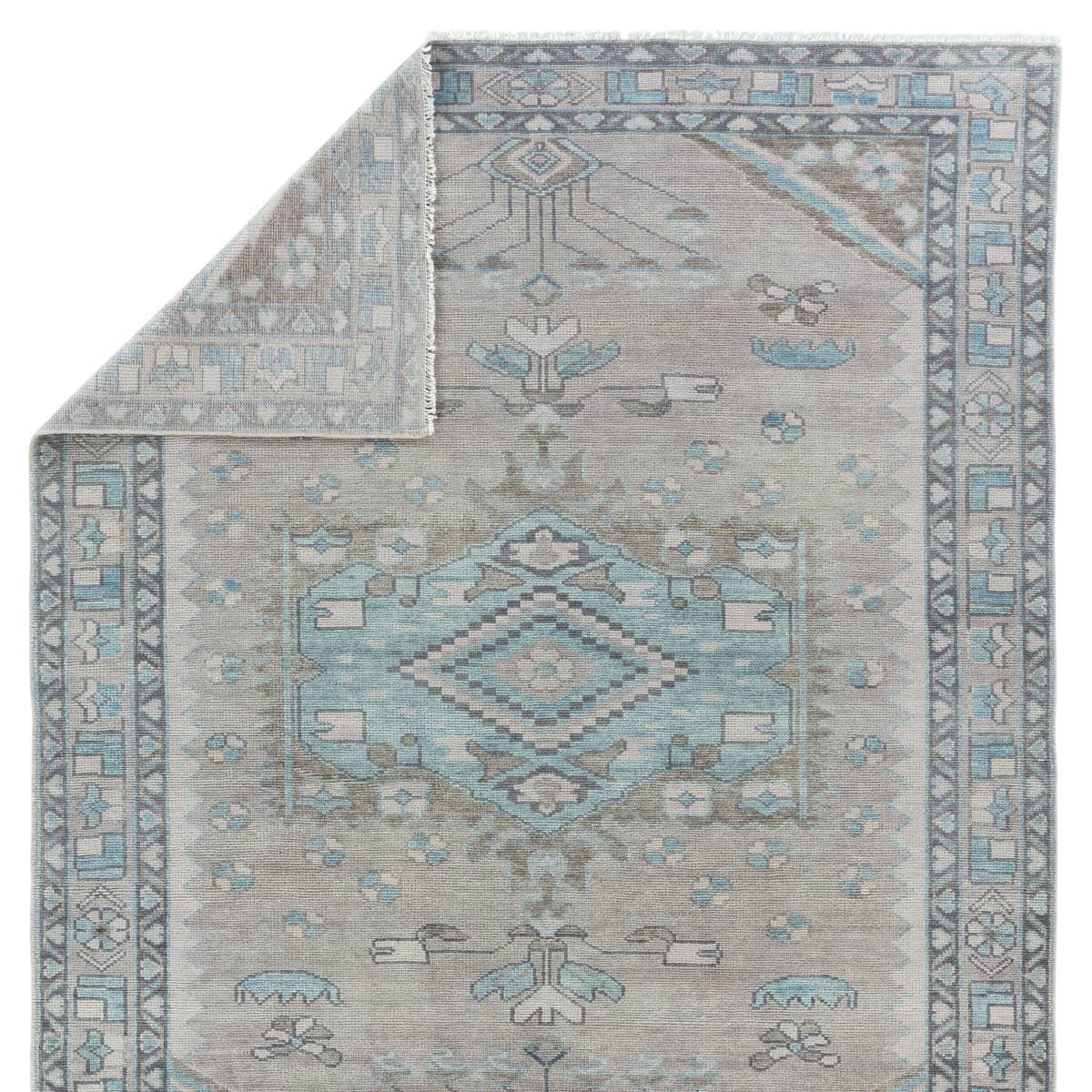 Featuring Salinas Santita Hand-Knotted Rug by Jaipur Living at Amethyst Home. The Salinas Santita is punctuated by both vibrant and neutral hues and combined with intricate details, lending a stunning transitional look to any home. The Santita rug makes a moody statement with grounding hues and a tribal, medallion motifs. This durable, artisan-made rug feat. Amethyst Home provides interior design, new home construction design consulting, vintage area rugs, and lighting in the Park City metro area.