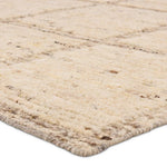 Featuring Seora Kizza Hand-Knotted Rug by Jaipur Living at Amethyst Home. Subtle linear textures and natural colorways define the irresistible quality of the Seora Kizza. The Kizza area rug features a linear grid for an intriguing dose of modern appeal. The textural, wool pile contains no dye, reflecting the natural colors of the sheep, for a rich and groun. Amethyst Home provides interior design, new home construction design consulting, vintage area rugs, and lighting in the Charlotte metro area.