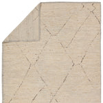 Featuring Seora Tepal Hand-Knotted Rug by Jaipur Living at Amethyst Home. Subtle linear textures and natural colorways define the irresistible quality of the Seora collection. The Tepal area rug features a distressed trellis motif for an intriguing dose of modern appeal. The textural, wool pile contains no dye, reflecting the natural colors of the sheep, for a rich and grounding. Amethyst Home provides interior design, new construction, custom furniture, and area rugs in the Washington metro area.