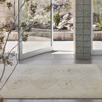 Featuring Sevak Ismail Hand-Knotted Rug by Jaipur Living at Amethyst Home. The hand-knotted Sevak Ismail emulates vintage rugs with traditional Turkish patterns, distressing, and a neutral color palette for versatility. The Ismail design features mini-medallions and a subtle border in tones of tan, cream, and brown. The fringe adds a global charm that delights. Amethyst Home provides interior design, new home construction design consulting, vintage area rugs, and lighting in the Boston metro area.