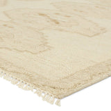 Featuring Sevak Ismail Hand-Knotted Rug by Jaipur Living at Amethyst Home. The hand-knotted Sevak Ismail emulates vintage rugs with traditional Turkish patterns, distressing, and a neutral color palette for versatility. The Ismail design features mini-medallions and a subtle border in tones of tan, cream, and brown. The fringe adds a global charm that delig. Amethyst Home provides interior design, new home construction design consulting, vintage area rugs, and lighting in the Charlotte metro area.