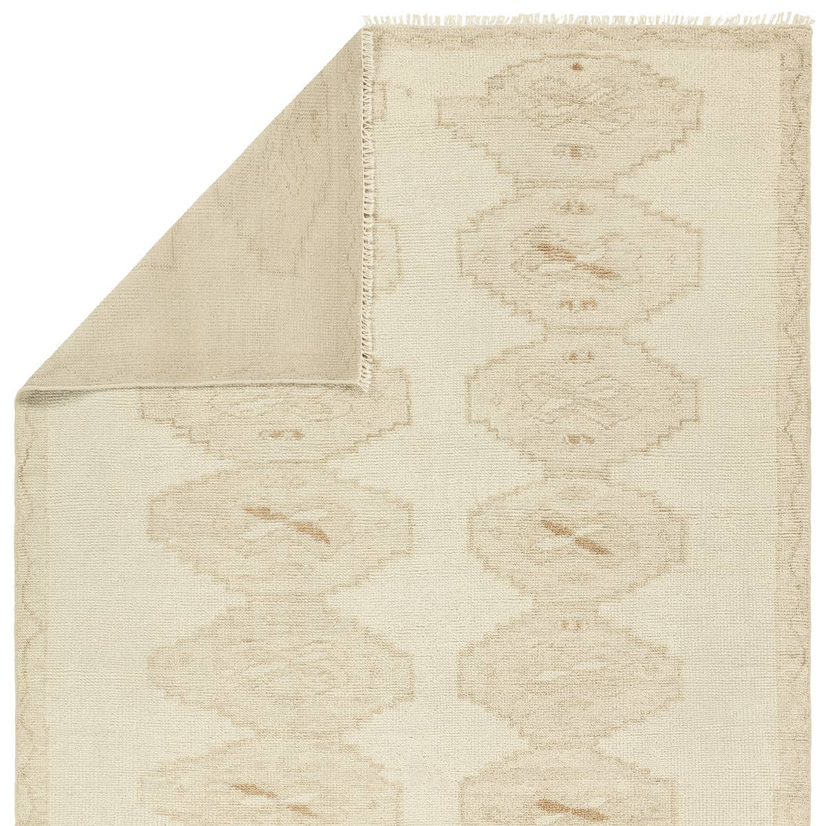 Featuring Sevak Ismail Hand-Knotted Rug by Jaipur Living at Amethyst Home. The hand-knotted Sevak Ismail emulates vintage rugs with traditional Turkish patterns, distressing, and a neutral color palette for versatility. The Ismail design features mini-medallions and a subtle border in tones of tan, cream, and brown. The fringe adds a global charm that delig. Amethyst Home provides interior design, new home construction design consulting, vintage area rugs, and lighting in the Nashville metro area.
