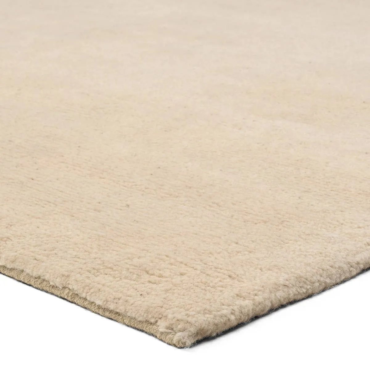 Featuring Si Blanc Theia Hand-Knotted Rug by Jaipur Living at Amethyst Home. Made from the exceptional soft fleece and durability of Alpaca and New Zealand Wool, the Si Blanc Theia creates uniform excellence as the understated centerpiece of a room. With its natural luster and timeless charm the Theia design made of cream Tibetan hand knots brings simple. Amethyst Home provides interior design, new home construction design consulting, vintage area rugs, and lighting in the Laguna Beach metro area.